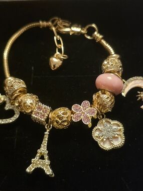 Gold-Tone Pink Charm Bracelet with Eiffel Tower Pendant